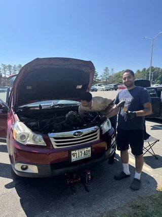 Out in the parking lot, first trying to save the original engine